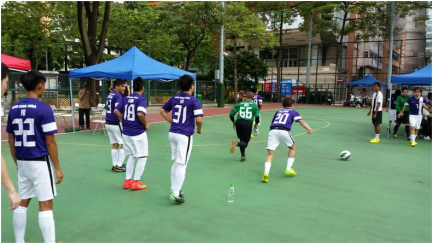 The Hong Kong representative team warms up on the side of the mini pitches.